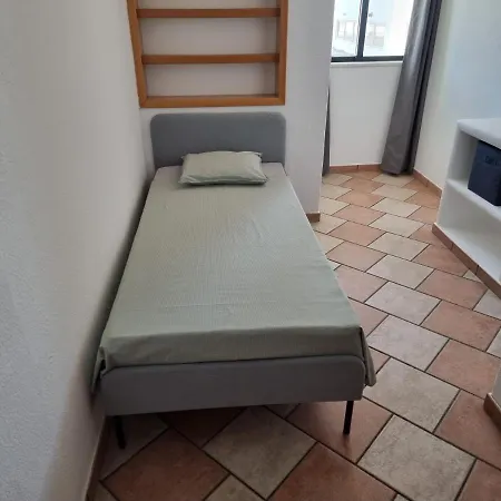 Com 3 Quartos Em Frente A Апартаменты Портиман